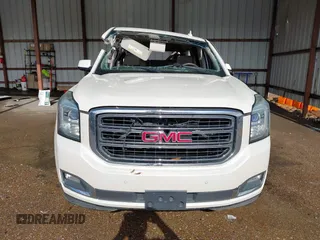 2015 GMC Yukon SLT with VIN 1GKS2BKC6FR612606, listed as a IAAI auction lot 41096580 with Not Provided miles and . Bid and sale history available at DreamBid. Image 13.