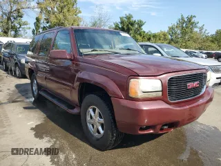 1999 GMC Denali z VIN 1GKEK13RXXR910328, wystawiony jako Copart lot #71494384 z przebiegiem 251 016 mil mil oraz Szkoda całkowita • Salvage title. Historia ofert i sprzedaży dostępna na DreamBid. Obrazek 4.