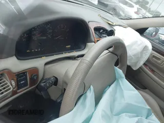 2000 Toyota Solara SE z VIN 2T1CF22P6YC324296, wystawiony jako IAAI lot #42178723 z przebiegiem Nie podano mil oraz . Historia ofert i sprzedaży dostępna na DreamBid. Obrazek 14.
