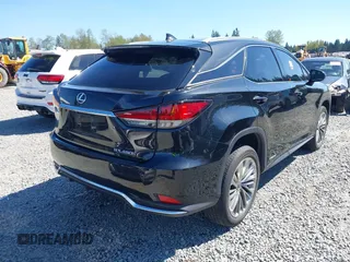 2022 Lexus RX 450h with VIN 2T2JGMDA4NC076274, listed as a IAAI auction lot 42075301 with 32,410 mi miles and . Bid and sale history available at DreamBid. Image 4.