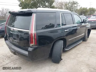 2018 Cadillac Escalade Luxury with VIN 1GYS4BKJ3JR143952, listed as a IAAI auction lot 41333902 with 124,265 mi miles. Bid and sale history available at carsss.com. Image 4.