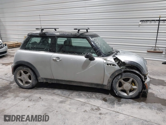 2002 MINI Hardtop with VIN WMWRC33422TC37296, listed as a IAAI auction lot 41385046 with 107,663 mi miles and . Bid and sale history available at DreamBid. Image 14.