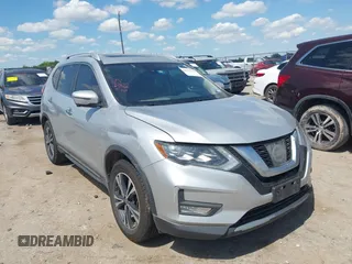 2017 Nissan Rogue SV with VIN JN8AT2MV1HW013267, listed as a IAAI auction lot 42233738 with 118,046 mi miles and . Bid and sale history available at DreamBid. Image 1.