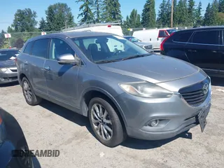 2014 Mazda CX-9 Grand Touring with VIN JM3TB2DA9E0435295, listed as a IAAI auction lot 42618683 with 177,783 mi miles and . Bid and sale history available at DreamBid. Image 1.