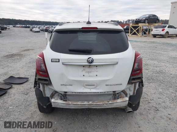 2017 Buick Encore Essence with VIN KL4CJCSB7HB011839, listed as a IAAI auction lot 41303660 with 80,789 mi miles and . Bid and sale history available at carsss.com. Image 17.