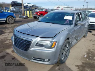 2014 Chrysler 300 with VIN 2C3CCAGG7EH255782, listed as a IAAI auction lot 41689454 with 148,912 mi miles. Bid and sale history available at carsss.com. Image 2.