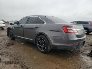 2015 Ford Taurus SEL with VIN 1FAHP2E8XFG104350, listed as a Copart auction lot 49139655 with 161,857 mi miles and Salvage title. Bid and sale history available at DreamBid. Image 2.