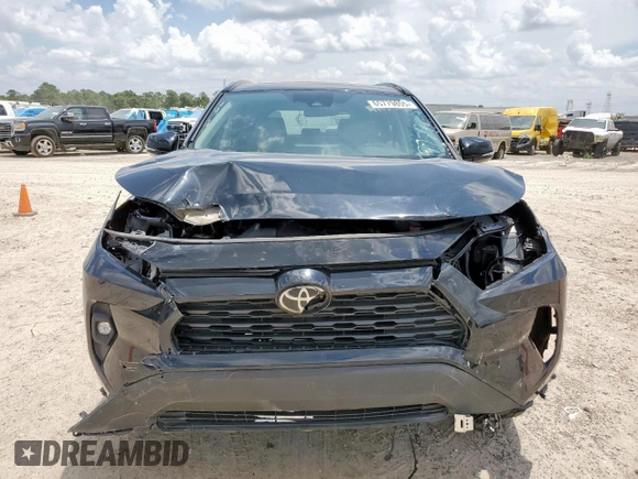 2022 Toyota RAV4 XLE Premium with VIN 2T3A1RFVXNC310217, listed as a Copart auction lot 65779855 with 31,626 mi miles and Salvage title. Bid and sale history available at DreamBid. Image 5.
