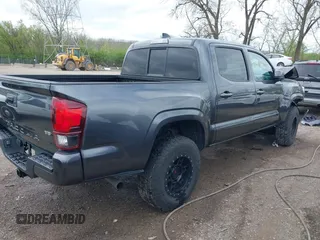 2022 Toyota Tacoma SR with VIN 3TMCZ5ANXNM483172, listed as a IAAI auction lot 42078035 with 36,088 mi miles and . Bid and sale history available at DreamBid. Image 4.