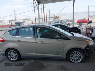 2015 Ford C-Max SEL z VIN 1FADP5CU8FL100255, wystawiony jako IAAI lot #42183172 z przebiegiem 101 606 mil mil oraz . Historia ofert i sprzedaży dostępna na DreamBid. Obrazek 14.