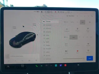 2018 Tesla Model 3 Long Range Battery with VIN 5YJ3E1EA0JF056979, listed as a IAAI auction lot 41865849 with 97,319 mi miles. Bid and sale history available at carsss.com. Image 18.