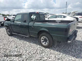 2002 Ford Ranger XLT Appearance with VIN 1FTYR44E42TA32828, listed as a Copart auction lot 60205715 with 290,846 mi miles and Salvage title. Bid and sale history available at DreamBid. Image 2.