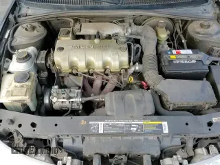 1997 Saturn SC with VIN 1G8ZF1286VZ350275, listed as a Copart auction lot 83010514 with 143,241 mi miles and Salvage title. Bid and sale history available at DreamBid. Image 13.