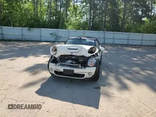 2015 MINI Convertible S с VIN WMWZP3C54F2A90956, выставлен на аукционе Copart как лот 57052545 с пробегом 39 096 миль миль и Списание • Salvage title. История ставок и продаж доступна на DreamBid. Изображение 13.