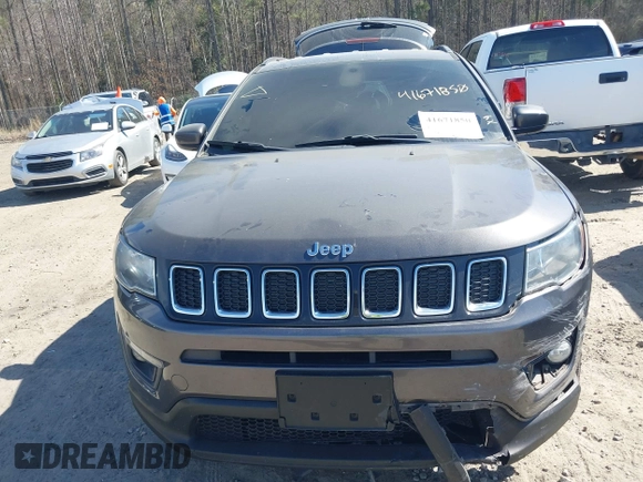 2018 Jeep Compass Altitude with VIN 3C4NJDBB2JT230751, listed as a IAAI auction lot 41671850 with 253,221 mi miles and . Bid and sale history available at carsss.com. Image 12.