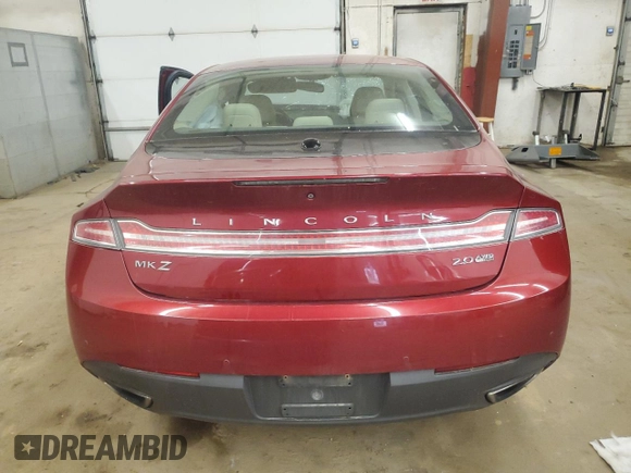 2015 Lincoln MKZ z VIN 3LN6L2J92FR624638, wystawiony jako Copart lot #57158245 z przebiegiem 150 045 mil mil oraz Szkoda całkowita • Salvage title. Historia ofert i sprzedaży dostępna na DreamBid. Obrazek 6.