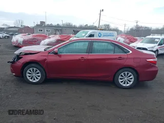 2015 Toyota Camry XLE with VIN 4T1BF1FK8FU983576, listed as a IAAI auction lot 41910503 with 62,941 mi miles. Bid and sale history available at carsss.com. Image 14.