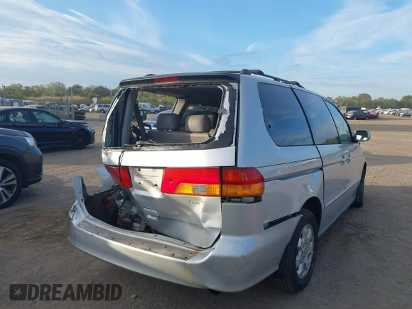 2003 Honda Odyssey EX-L with VIN 5FNRL18973B007802, listed as a IAAI auction lot 40365765 with 278,759 mi miles and . Bid and sale history available at DreamBid. Image 17.