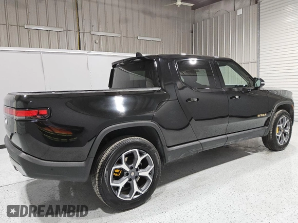 2022 Rivian R1T Adventure z VIN 7FCTGAAA5NN007486, wystawiony jako Copart lot #52649075 z przebiegiem 23 292 mil mil oraz Czysty tytuł • Clean title. Historia ofert i sprzedaży dostępna na DreamBid. Obrazek 3.