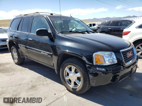 2005 GMC Envoy SLE z VIN 1GKDT13S752390266, wystawiony jako Copart lot #50766935 z przebiegiem 115 225 mil mil oraz Szkoda całkowita • Salvage title. Historia ofert i sprzedaży dostępna na DreamBid. Obrazek 4.