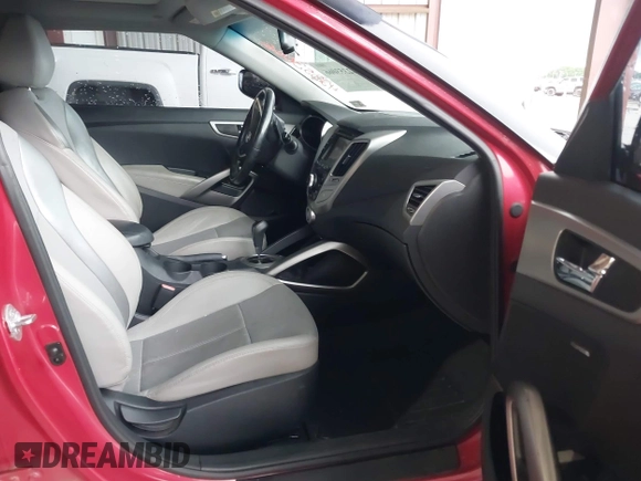 2014 Hyundai Veloster z VIN KMHTC6AD3EU201508, wystawiony jako IAAI lot #42353066 z przebiegiem 140 032 mil mil oraz . Historia ofert i sprzedaży dostępna na DreamBid. Obrazek 5.