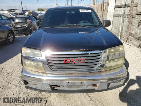 2005 GMC Canyon 1SF SLE Z71 with VIN 1GTDT136X58194608, listed as a Copart auction lot 83257094 with 260,923 mi miles and Salvage Title. Bid and sale history available at carsss.com. Image 5.