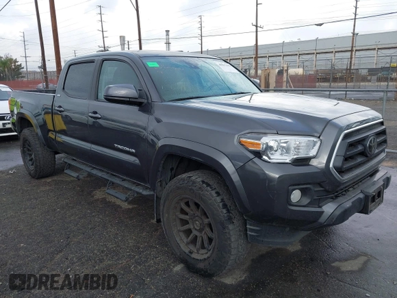 2022 Toyota Tacoma SR5 with VIN 3TMBZ5DN2NM034561, listed as a IAAI auction lot 40867443 with 51,728 mi miles and . Bid and sale history available at DreamBid. Image 1.
