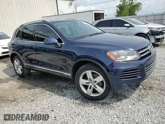2013 Volkswagen Touareg Lux с VIN WVGEF9BP0DD002456, выставлен на аукционе Copart как лот 56034435 с пробегом 131 412 миль миль и Списание • Salvage title. История ставок и продаж доступна на DreamBid. Изображение 14.