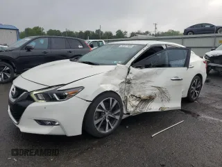 2017 Nissan Maxima SR with VIN 1N4AA6AP2HC435652, listed as a Copart auction lot 59127405 with 104,421 mi miles and Salvage title. Bid and sale history available at DreamBid. Image 1.