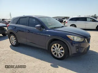 2013 Mazda CX-5 Grand Touring with VIN JM3KE2DE4D0147902, listed as a Copart auction lot 52696685 with 331,168 mi miles and Clean Title. Bid and sale history available at carsss.com. Image 4.