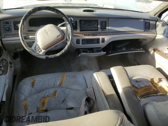 1996 Lincoln Town Car Signature with VIN 1LNLM82WXTY654457, listed as a Copart auction lot 53097635 with 257,446 mi miles and Salvage title. Bid and sale history available at DreamBid. Image 8.