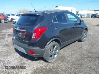 2014 Buick Encore Convenience with VIN KL4CJBSBXEB749396, listed as a IAAI auction lot 41860171 with 52,644 mi miles and . Bid and sale history available at DreamBid. Image 4.