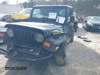 2006 Jeep Wrangler Sport with VIN 1J4FA49S66P732419, listed as a IAAI auction lot 41607851 with 120,099 mi miles. Bid and sale history available at carsss.com. Image 2.