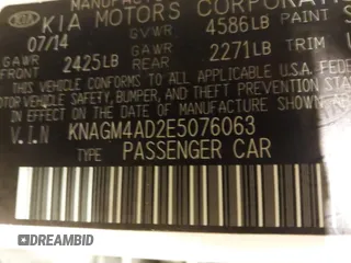 2014 Kia Optima LX with VIN KNAGM4AD2E5076063, listed as a IAAI auction lot 42014109 with 159,450 mi miles and . Bid and sale history available at DreamBid. Image 9.