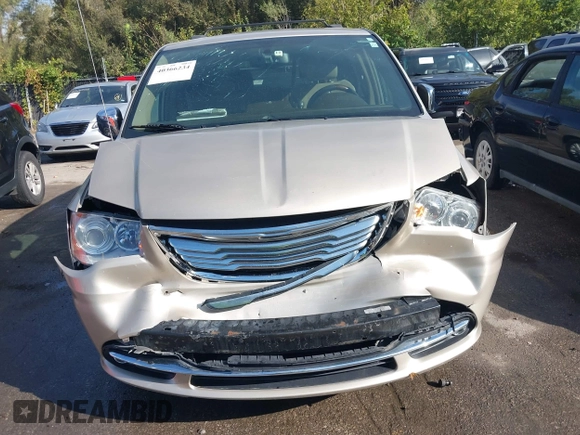 2015 Chrysler Town & Country Limited Platinum with VIN 2C4RC1GGXFR619209, listed as a IAAI auction lot 40366234 with 163,649 mi miles. Bid and sale history available at carsss.com. Image 6.
