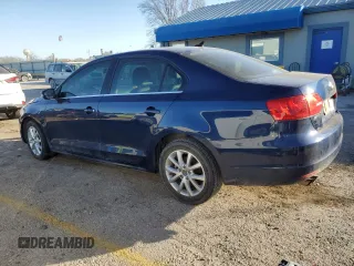 2013 Volkswagen Jetta SE with VIN 3VWDX7AJ6DM422416, listed as a Copart auction lot 87160204 with 138,429 mi miles and Salvage title. Bid and sale history available at DreamBid. Image 2.
