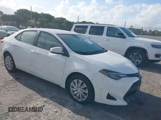 2019 Toyota Corolla L with VIN 2T1BURHE0KC179280, listed as a IAAI auction lot 41944624 with 102,964 mi miles. Bid and sale history available at carsss.com. Image 1.