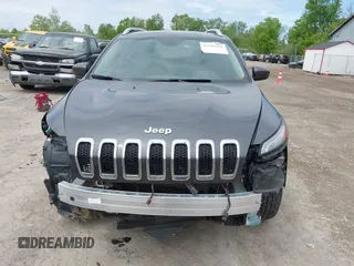 2017 Jeep Cherokee Latitude with VIN 1C4PJMCBXHW515628, listed as a IAAI auction lot 42295318 with 88,923 mi miles and . Bid and sale history available at DreamBid. Image 13.
