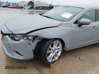 2016 Mazda 6 i Touring with VIN JM1GJ1V52G1463042, listed as a IAAI auction lot 42369747 with 136,849 mi miles and . Bid and sale history available at DreamBid. Image 6.