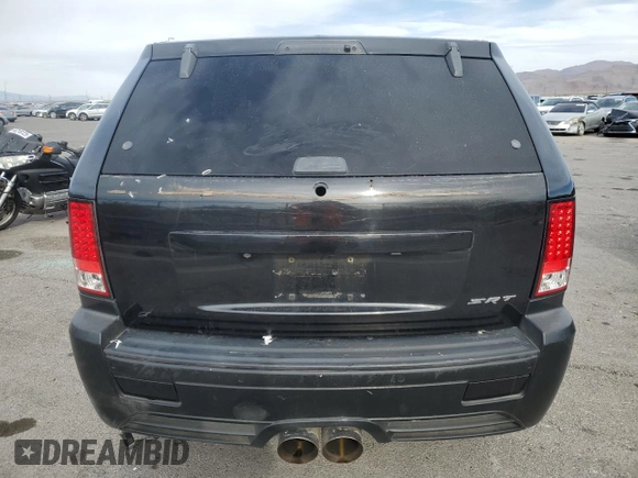 2008 Jeep Grand Cherokee SRT-8 with VIN 1J8HR78398C214004, listed as a Copart auction lot 48760375 with 165,318 mi miles and Salvage Title. Bid and sale history available at carsss.com. Image 6.