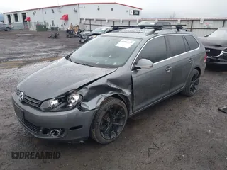 2014 Volkswagen Jetta SportWagen TDI with VIN 3VWPL7AJ9EM626122, listed as a IAAI auction lot 41896727 with 72,701 mi miles. Bid and sale history available at carsss.com. Image 2.