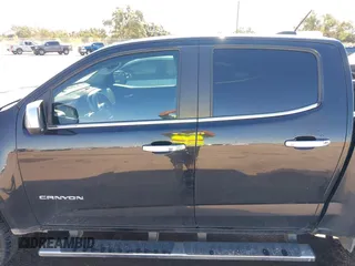 2016 GMC Canyon 2WD SLT with VIN 1GTG5DE35G1184141, listed as a IAAI auction lot 40875490 with 126,747 mi miles. Bid and sale history available at carsss.com. Image 14.