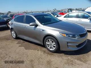 2016 Kia Optima LX with VIN 5XXGT4L39GG116566, listed as a IAAI auction lot 41949407 with 82,679 mi miles and . Bid and sale history available at carsss.com. Image 1.