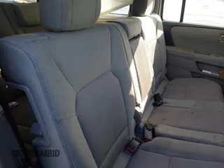 2015 Honda Pilot SE with VIN 5FNYF4H33FB064910, listed as a IAAI auction lot 41357315 with 115,879 mi miles and . Bid and sale history available at DreamBid. Image 8.