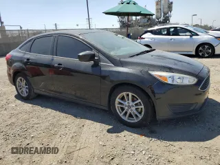 2018 Ford Focus SE z VIN 1FADP3FE0JL293485, wystawiony jako Copart lot #61202625 z przebiegiem 91 025 mil mil oraz Szkoda całkowita • Salvage title. Historia ofert i sprzedaży dostępna na DreamBid. Obrazek 4.