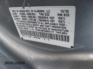 2006 Honda Odyssey EX-L with VIN 5FNRL38706B031177, listed as a IAAI auction lot 42123001 with 146,149 mi miles. Bid and sale history available at carsss.com. Image 9.