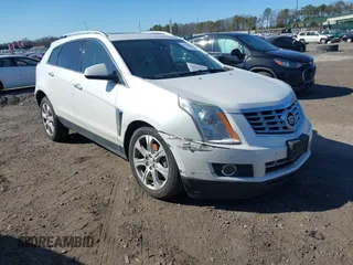 2015 Cadillac SRX Performance Collection with VIN 3GYFNFE35FS573814, listed as a IAAI auction lot 41770696 with 119,205 mi miles and . Bid and sale history available at DreamBid. Image 1.