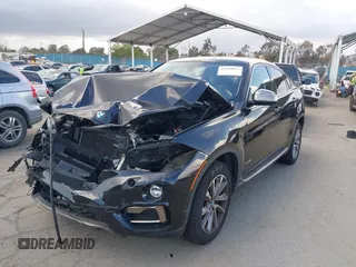 2016 BMW X6 xDrive35i z VIN 5UXKU2C50G0N83968, wystawiony jako IAAI lot #41958971 z przebiegiem 70 738 mil mil oraz . Historia ofert i sprzedaży dostępna na DreamBid. Obrazek 2.
