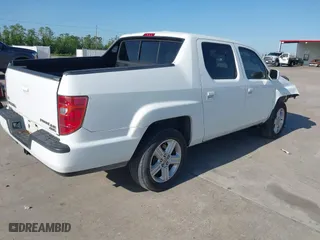2010 Honda Ridgeline RTL with VIN 5FPYK1F54AB011339, listed as a IAAI auction lot 41983918 with 201,124 mi miles. Bid and sale history available at carsss.com. Image 4.