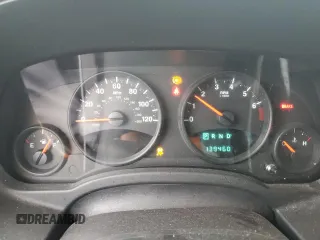 2012 Jeep Patriot Sport z VIN 1C4NJRBBXCD563771, wystawiony jako Copart lot #60524765 z przebiegiem 139 460 mil mil oraz Szkoda całkowita • Salvage title. Historia ofert i sprzedaży dostępna na DreamBid. Obrazek 9.